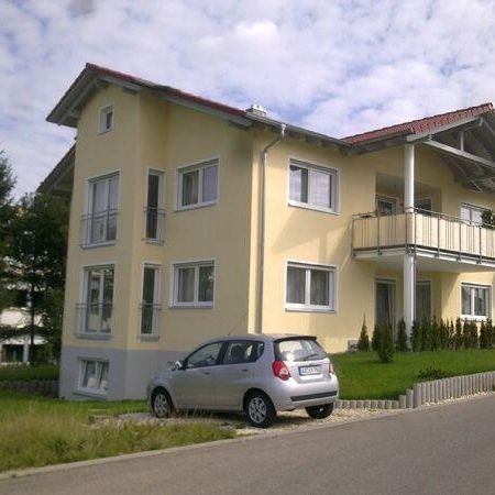 Ansicht von einem Mehrfamilienhaus wo Außenputz angebracht worden ist